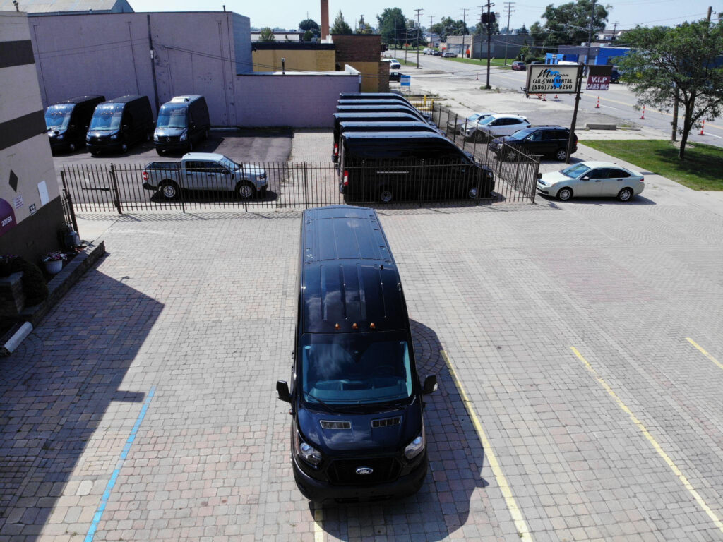 A parking area with van rentals. 