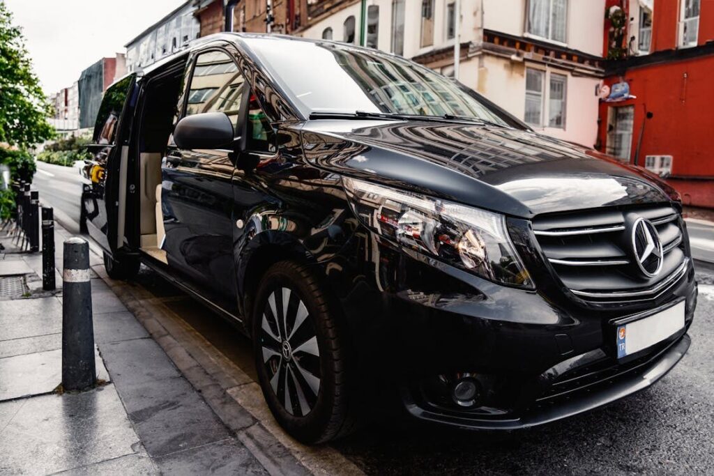 A sleek black passenger van1