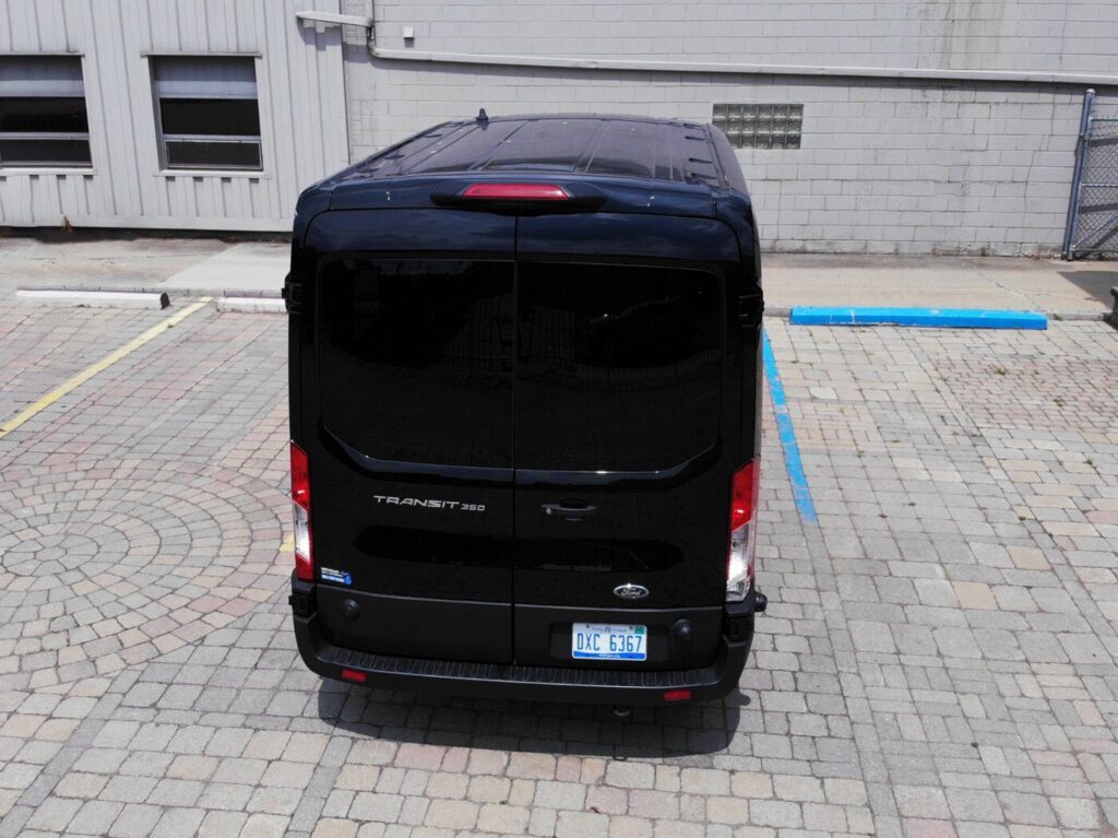 A black van in a parked position