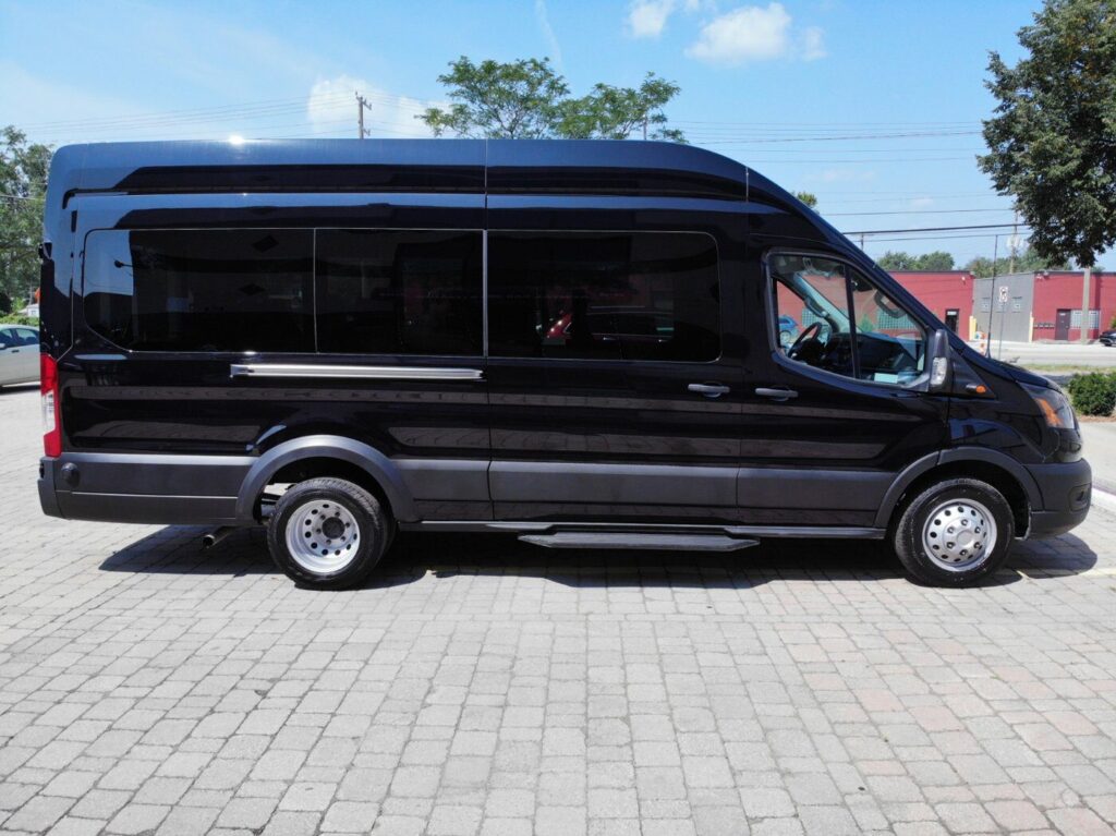 Black passenger van parked outdoors